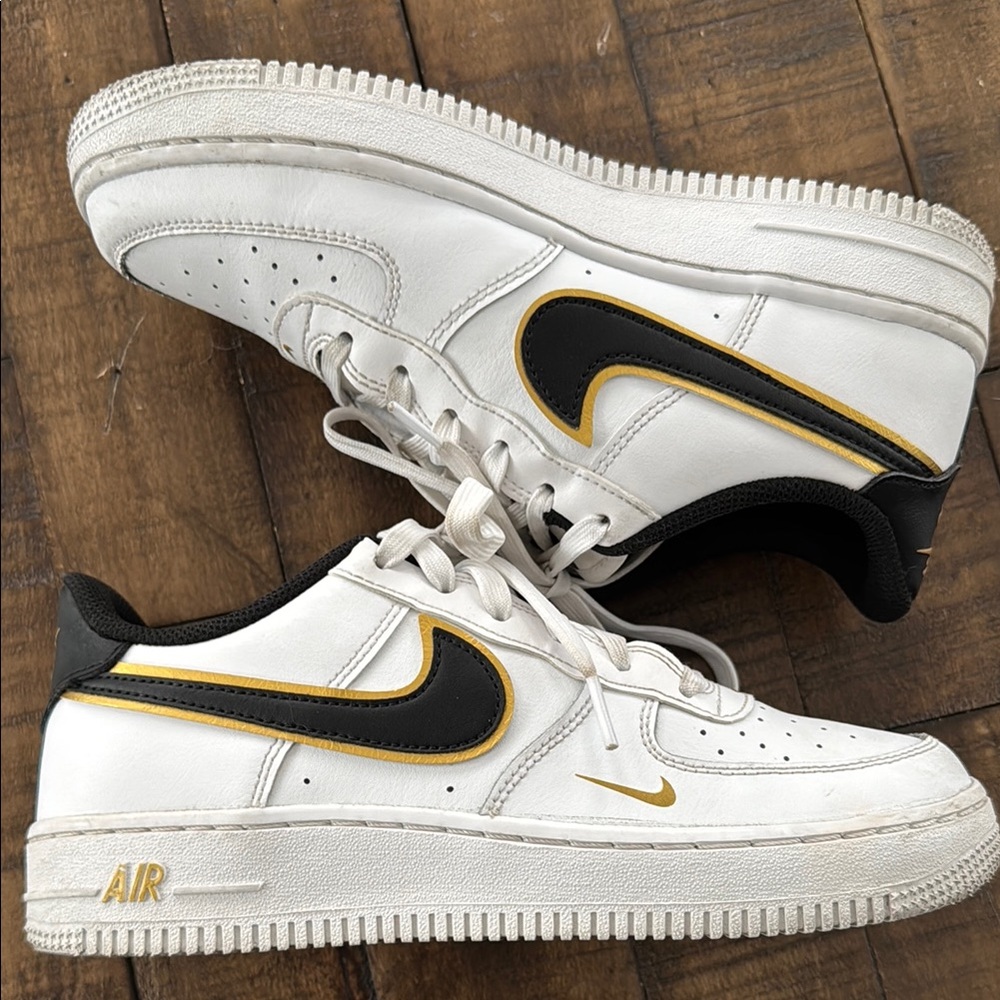 Boys Nike Air Force 1 LVB White Sneakers with Black and Gold Accents